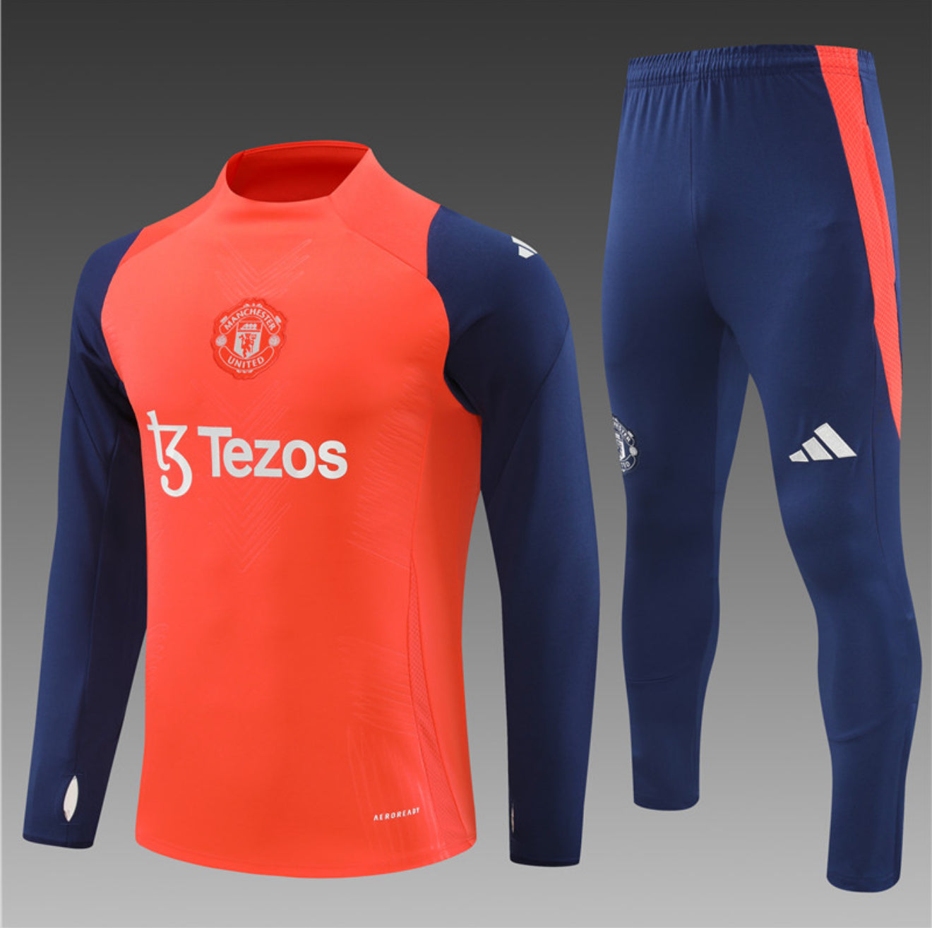 24/25 Manchester United Orange And Navy Tracksuit