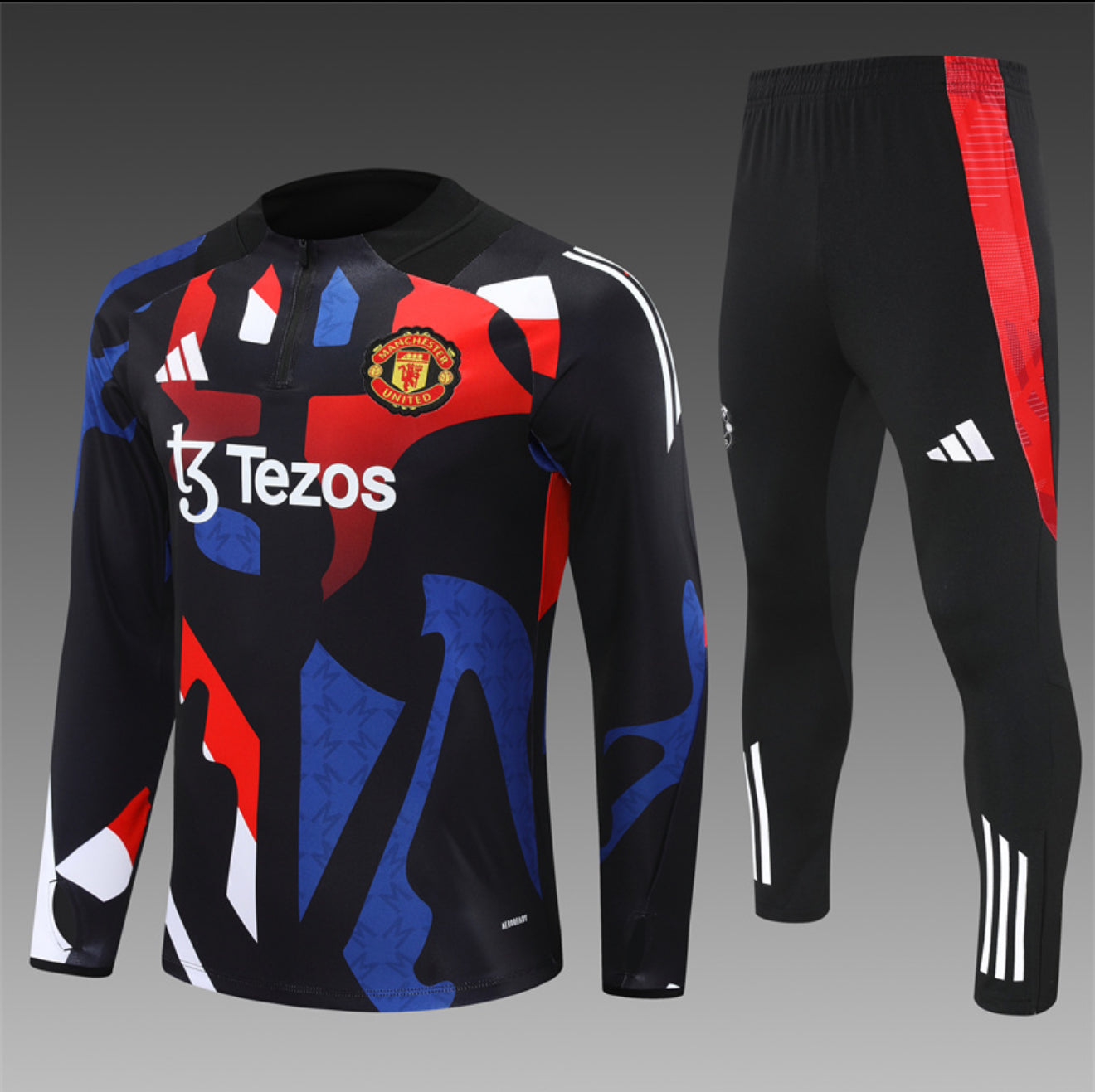 24/25 Manchester United Red, Black And Blue 1/4 Zip Tracksuit