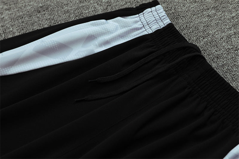 24/25 Real Madrid Black And White 1/4 Zip Tracksuit