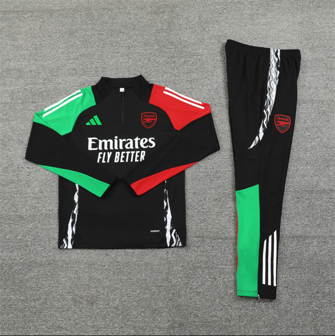 24/25 Arsenal FC Black, Green And Red 1/4 Zip Tracksuit