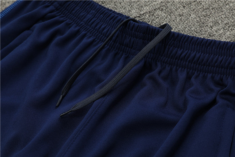 23/24 Manchester United Dark Blue 1/4 Zip Tracksuit