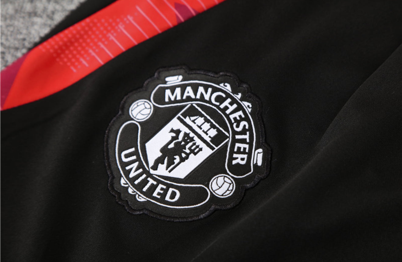 24/25 Manchester United White, Black And Red 1/4 Zip Tracksuit