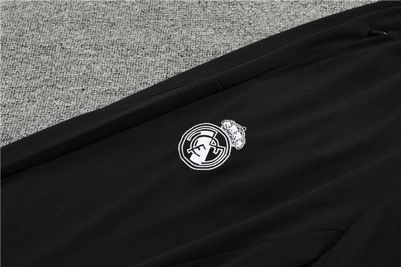 23/24 Real Madrid Black 1/4 Zip Tracksuit