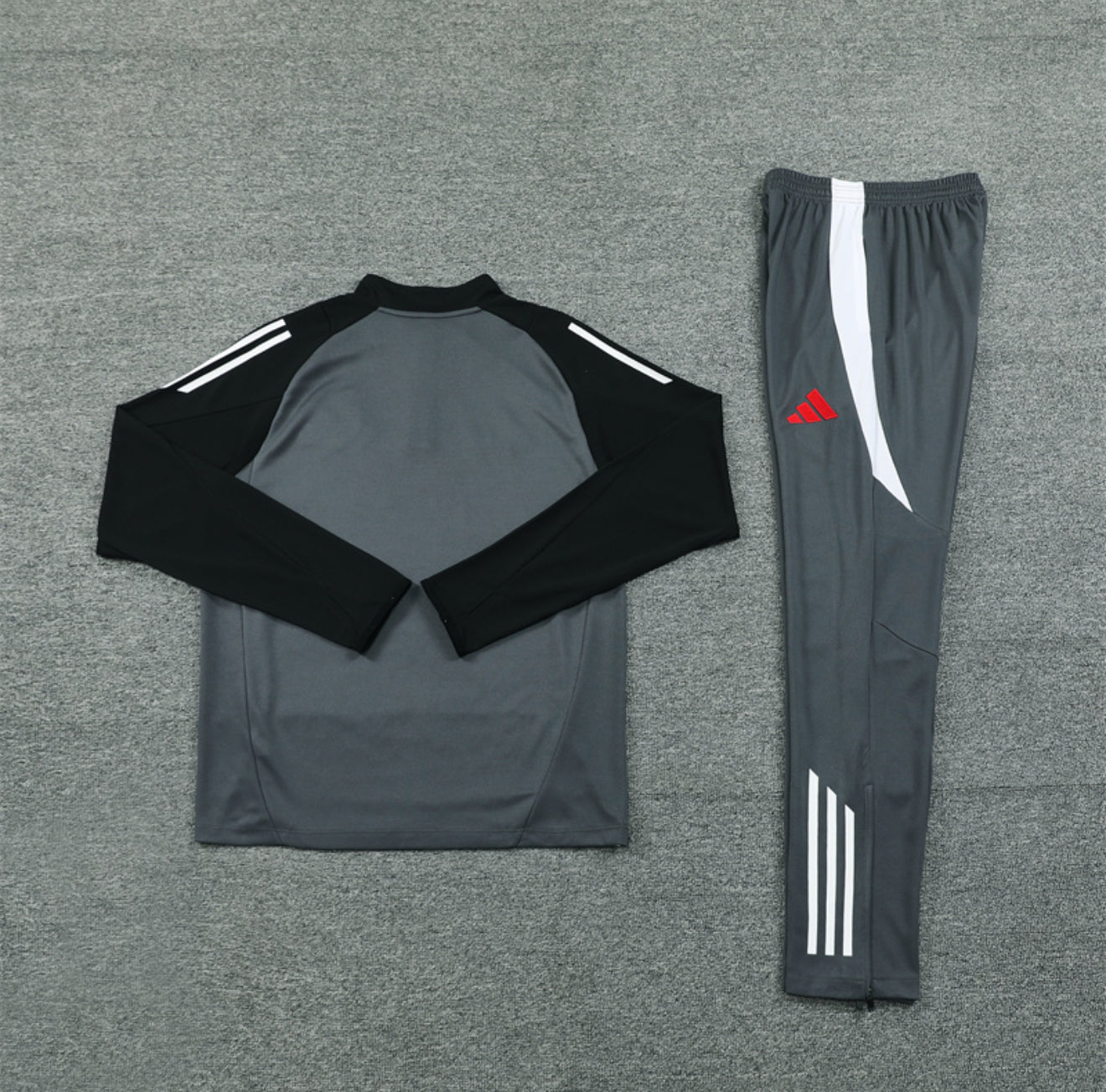 24/25 Manchester United Dark Grey 1/4 Zip Tracksuit