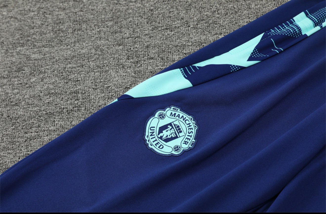24/25 Manchester United Light Blue 1/4 Zip Tracksuit