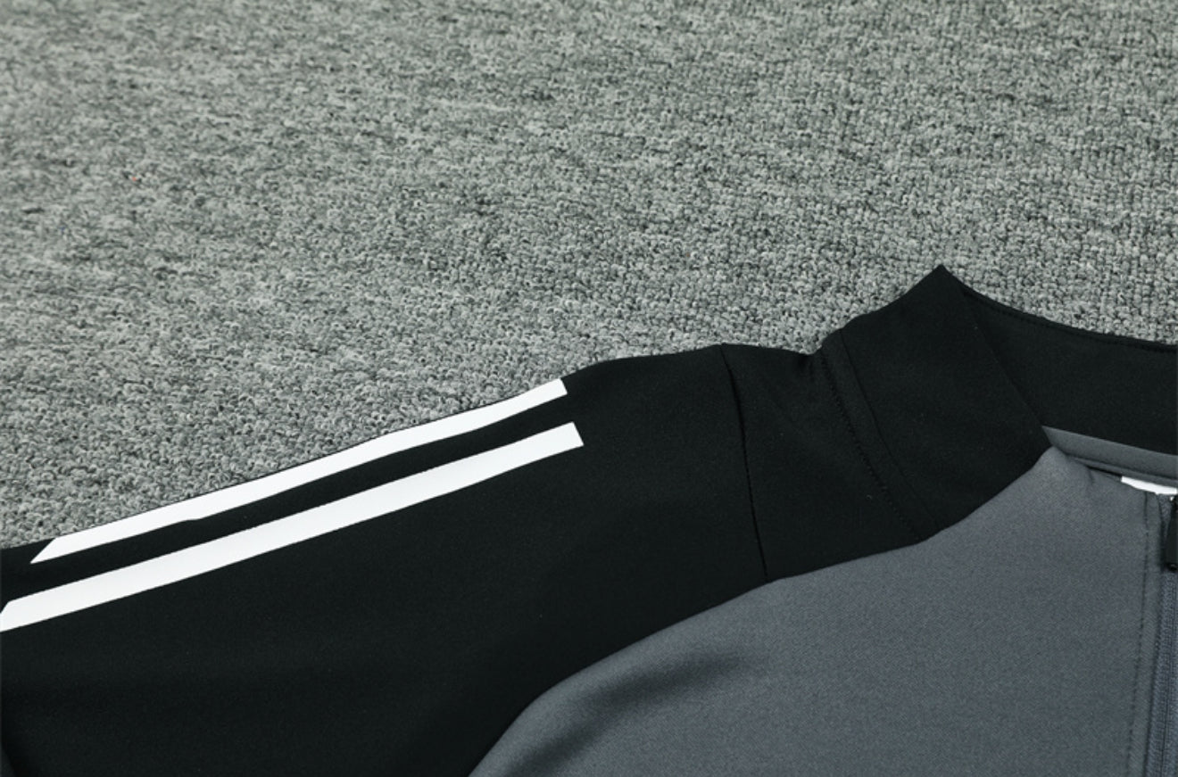 24/25 Manchester United Dark Grey 1/4 Zip Tracksuit
