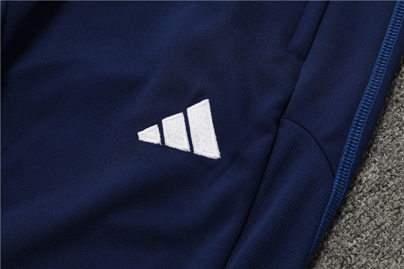 23/24 Manchester United Dark Blue 1/4 Zip Tracksuit
