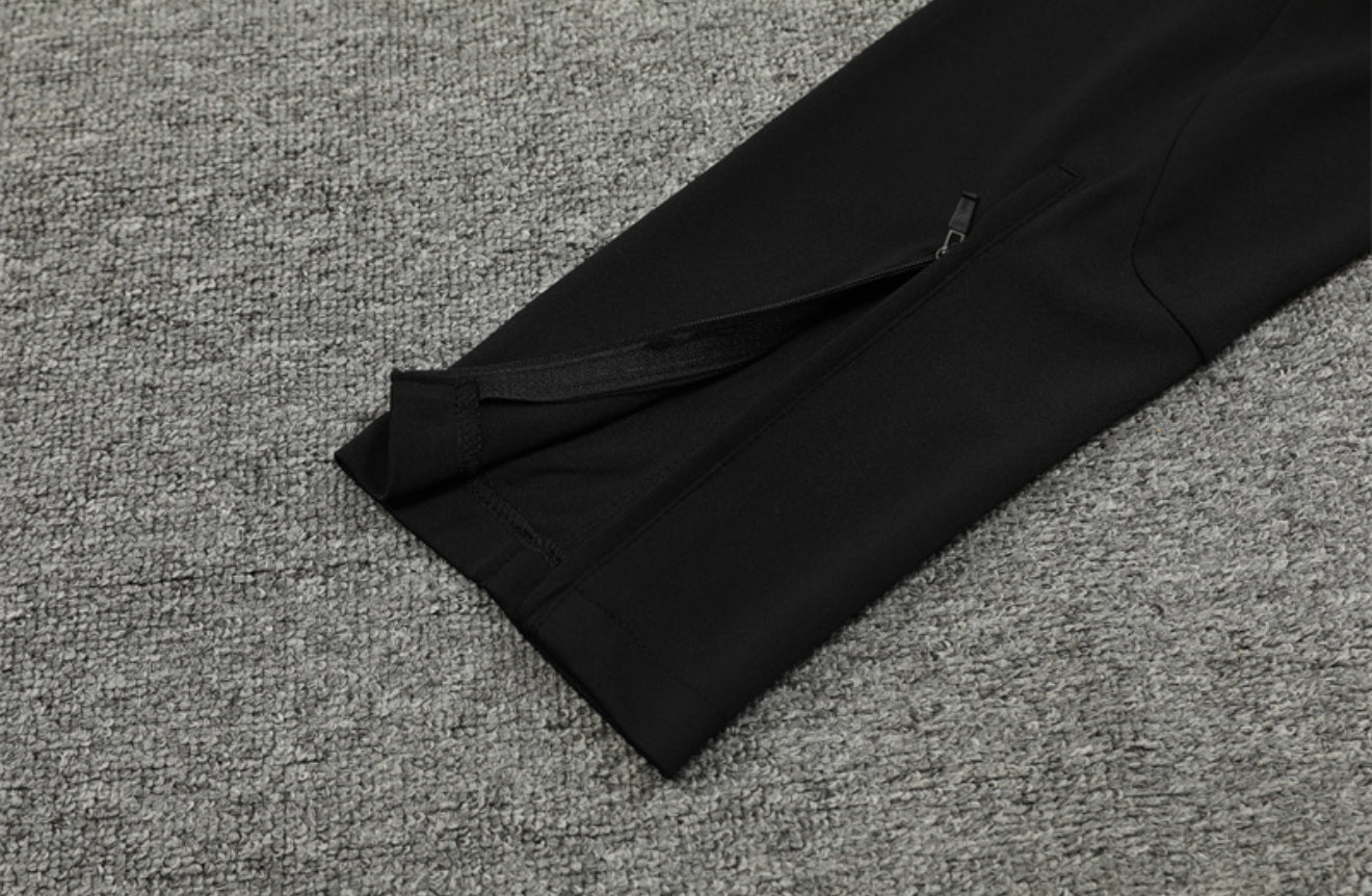 24/25 Real Madrid Black And Gold Tracksuit