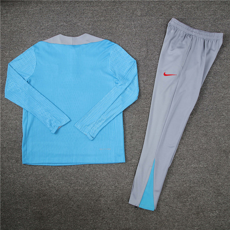 24/25 Atletico Madrid Light Blue And Grey 1/4 Zip Tracksuit