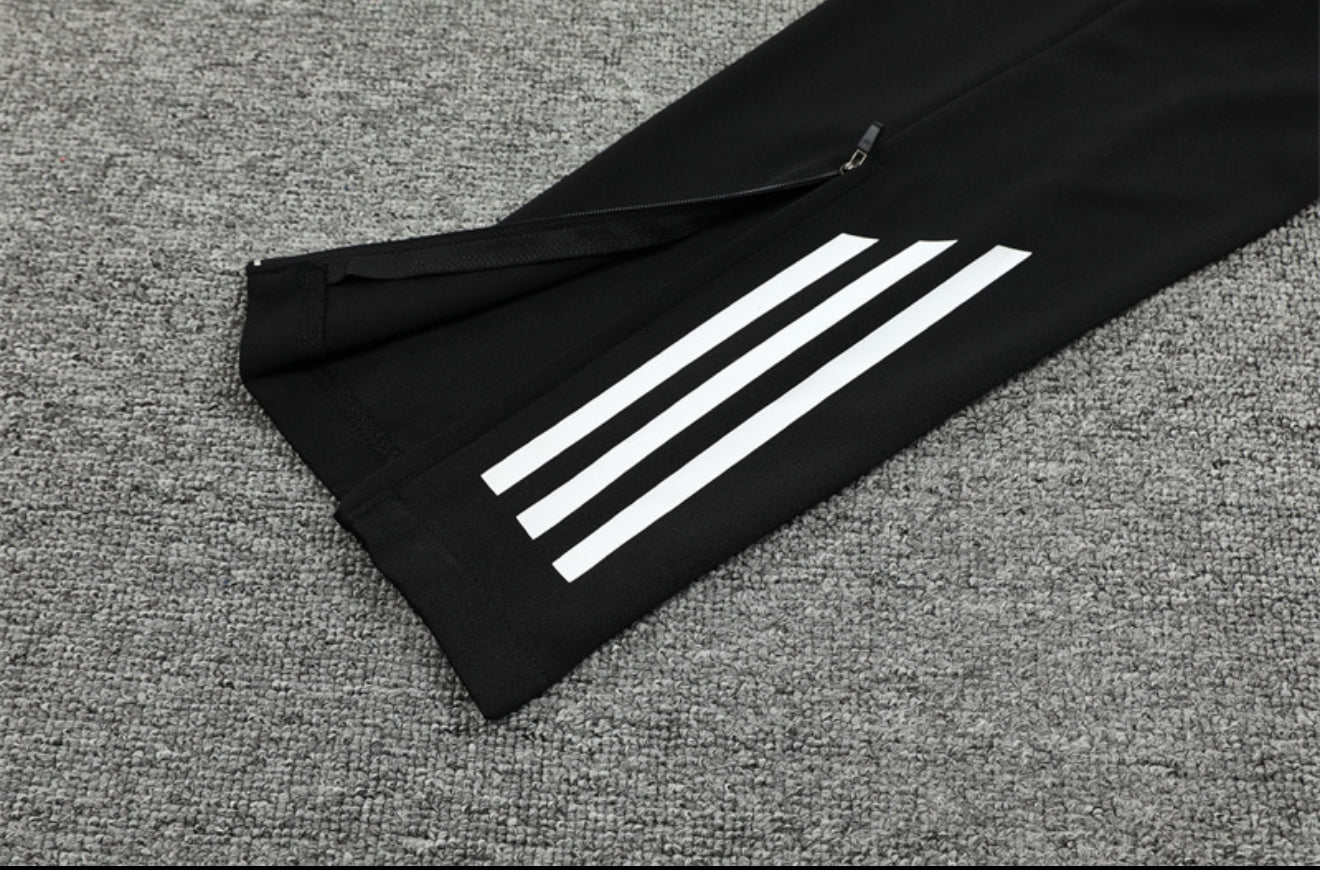 24/25 Real Madrid Black And Purple 1/4 Zip Tracksuit
