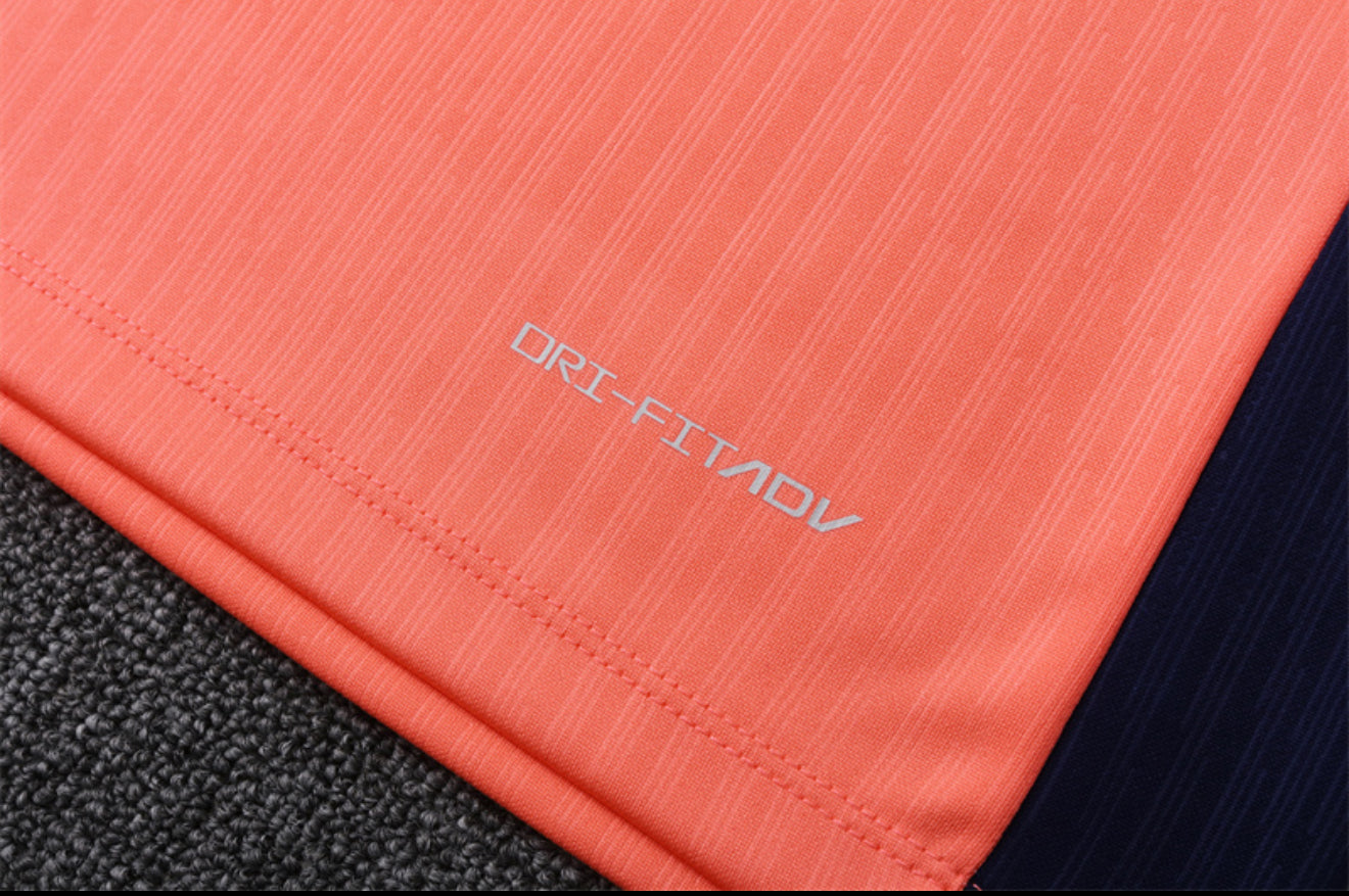 24/25 FC Barcelona Orange And Navy 1/4 Zip Tracksuit