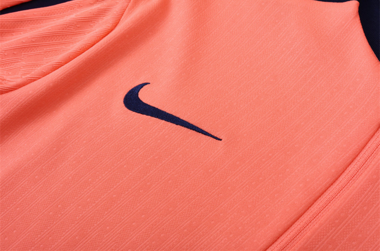 24/25 FC Barcelona Orange And Navy 1/4 Zip Tracksuit