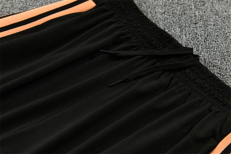 26/27 Arsenal Black And Orange 1/4 Zip Tracksuit