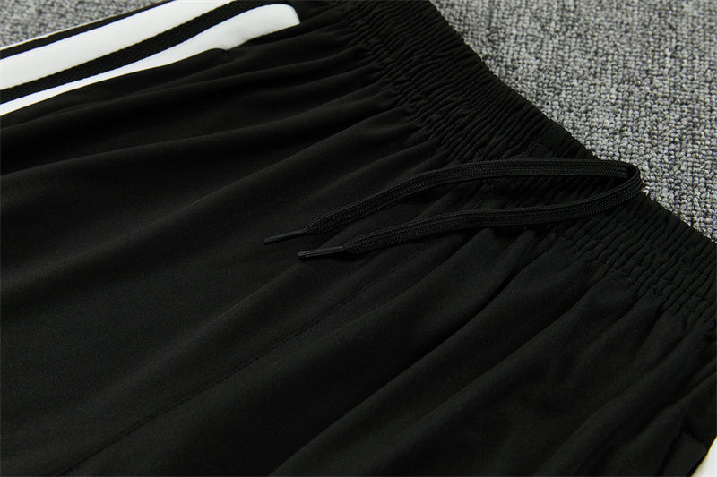 26/27 Liverpool FC Black And White 1/4 Zip Tracksuit