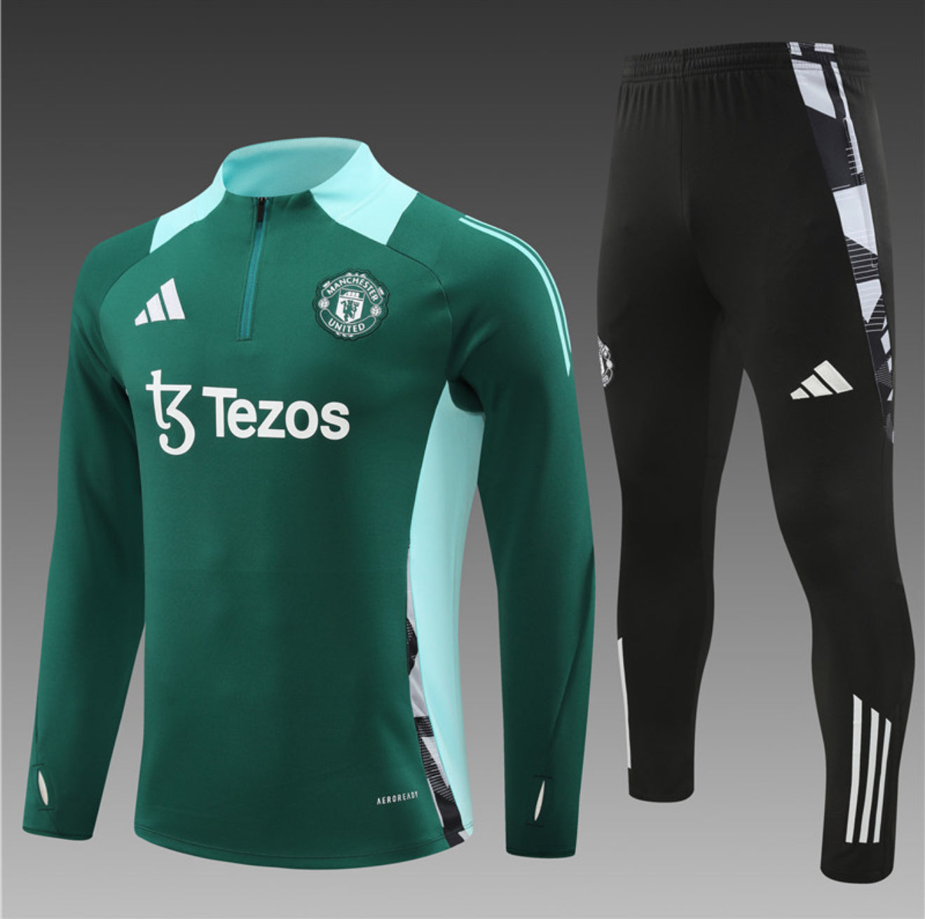 24/25 Manchester United Green And Black 1/4 Zip Tracksuit