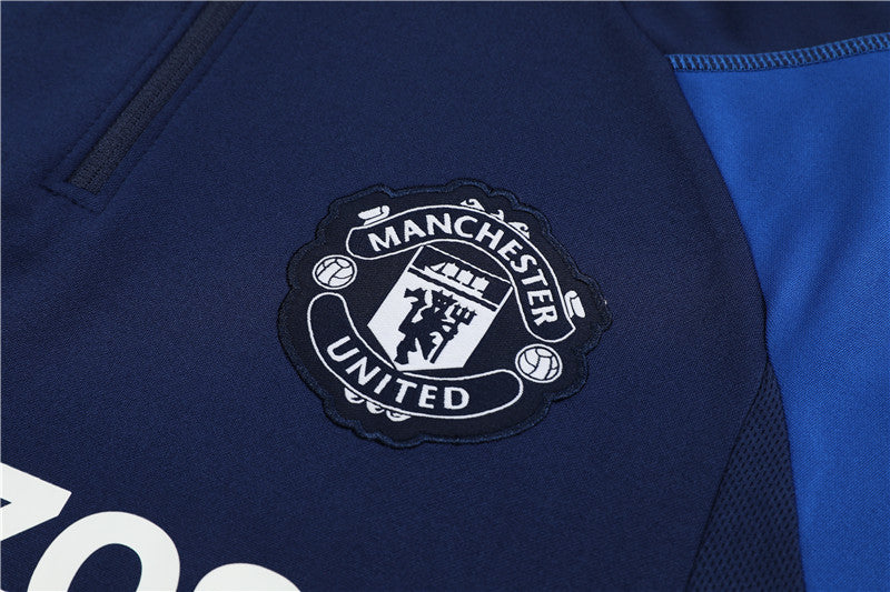 23/24 Manchester United Dark Blue 1/4 Zip Tracksuit