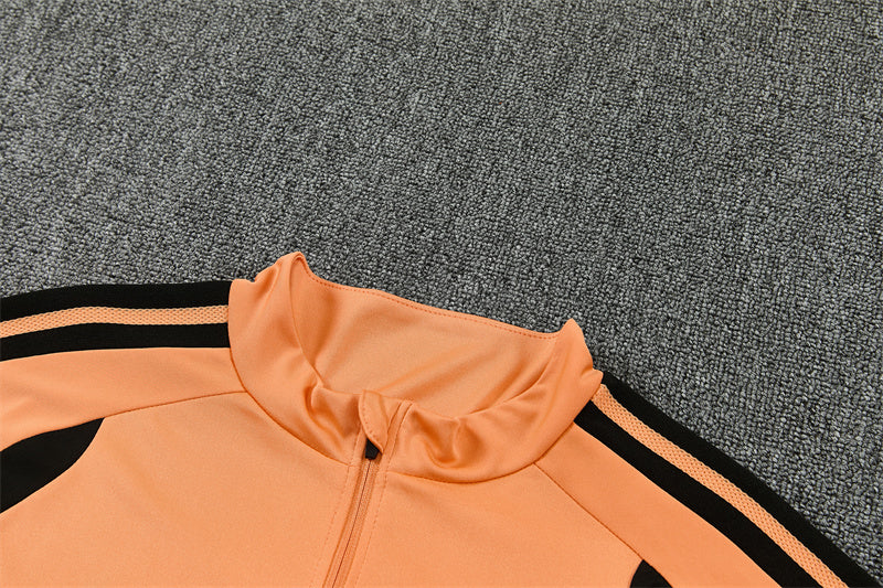 26/27 Arsenal FC Orange And Black 1/4 Zip Tracksuit