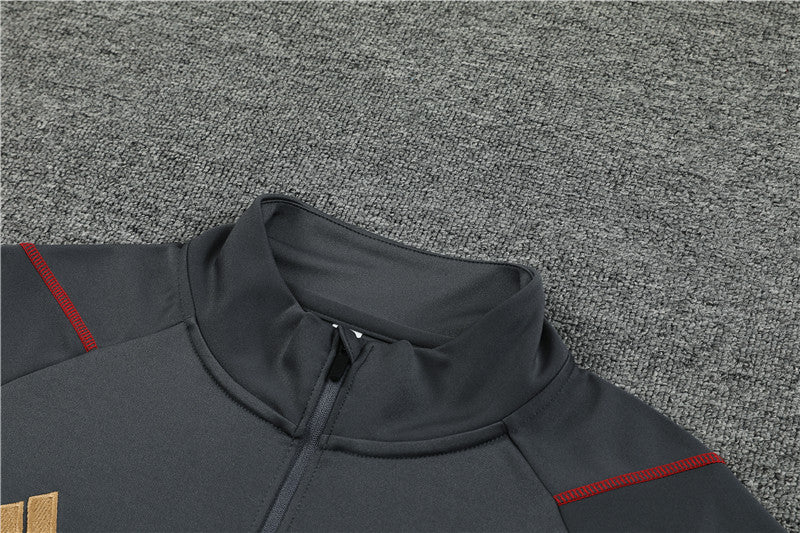 23/24 Arsenal FC Dark Grey And Gold 1/4 Zip Tracksuit