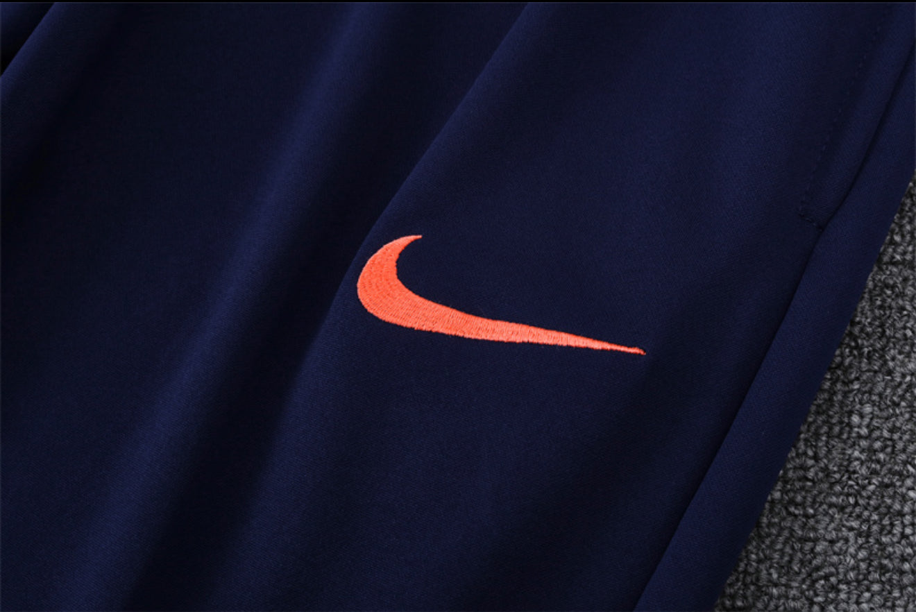 24/25 FC Barcelona Navy And Orange 1/4 Zip Tracksuit