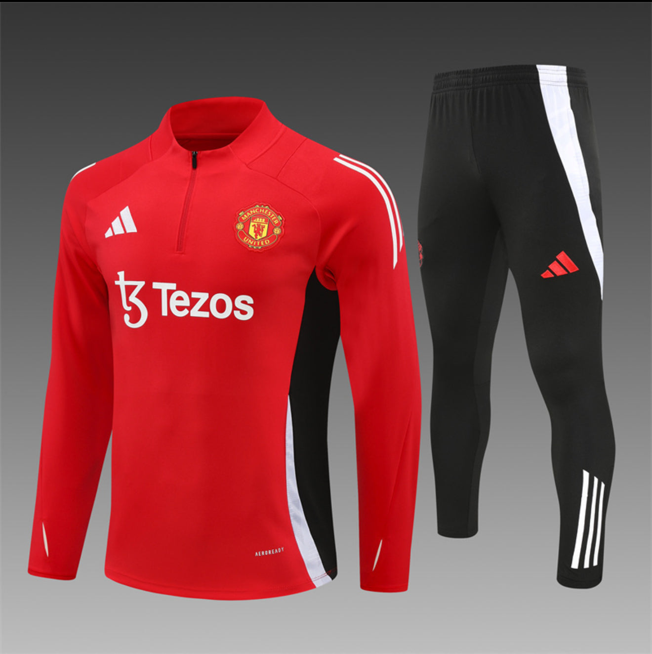 24/25 Manchester United Red 1/4 Zip Tracksuit
