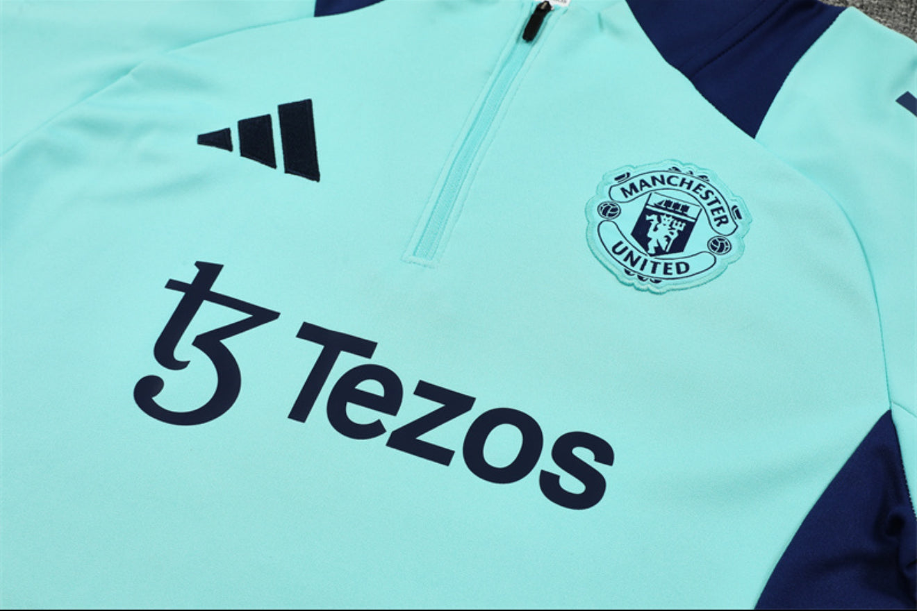 24/25 Manchester United Light Blue 1/4 Zip Tracksuit
