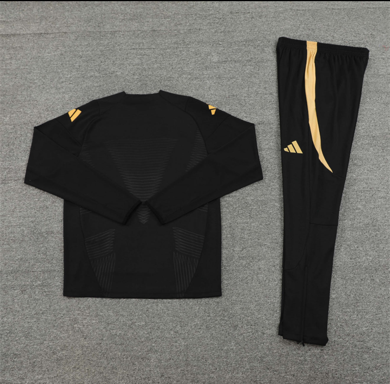 24/25 Real Madrid Black And Gold Tracksuit