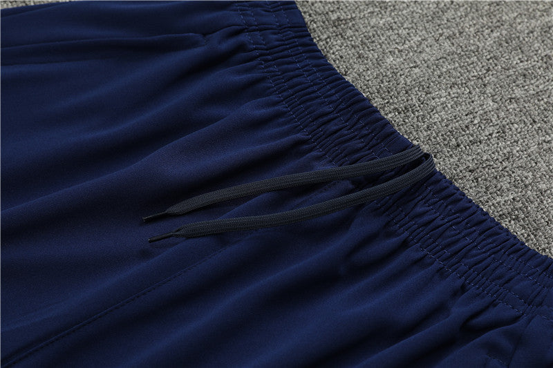 23/24 FC Barcelona Blue 1/4 Zip Tracksuit