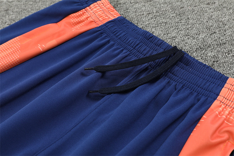 24/25 Manchester United Blue And Orange 1/4 Zip Tracksuit