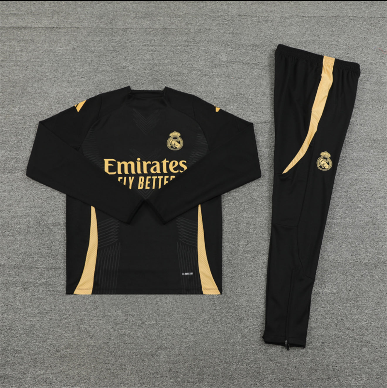 24/25 Real Madrid Black And Gold Tracksuit