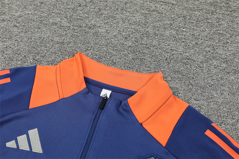 24/25 Manchester United Blue And Orange 1/4 Zip Tracksuit