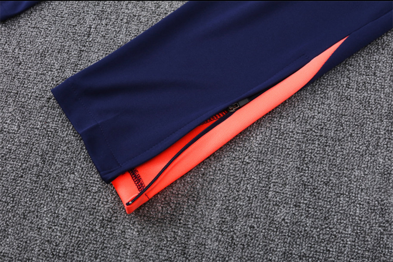 24/25 FC Barcelona Orange And Navy 1/4 Zip Tracksuit