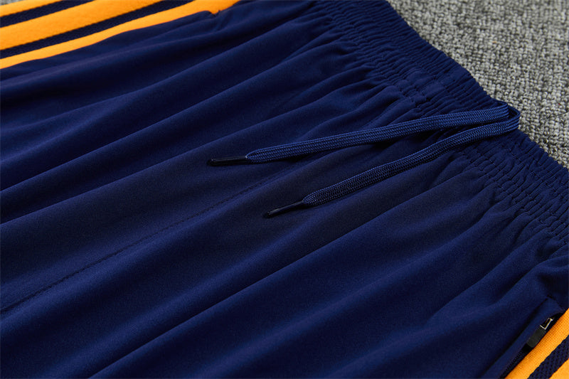 26/27 Real Madrid Navy And Orange 1/4 Zip Tracksuit