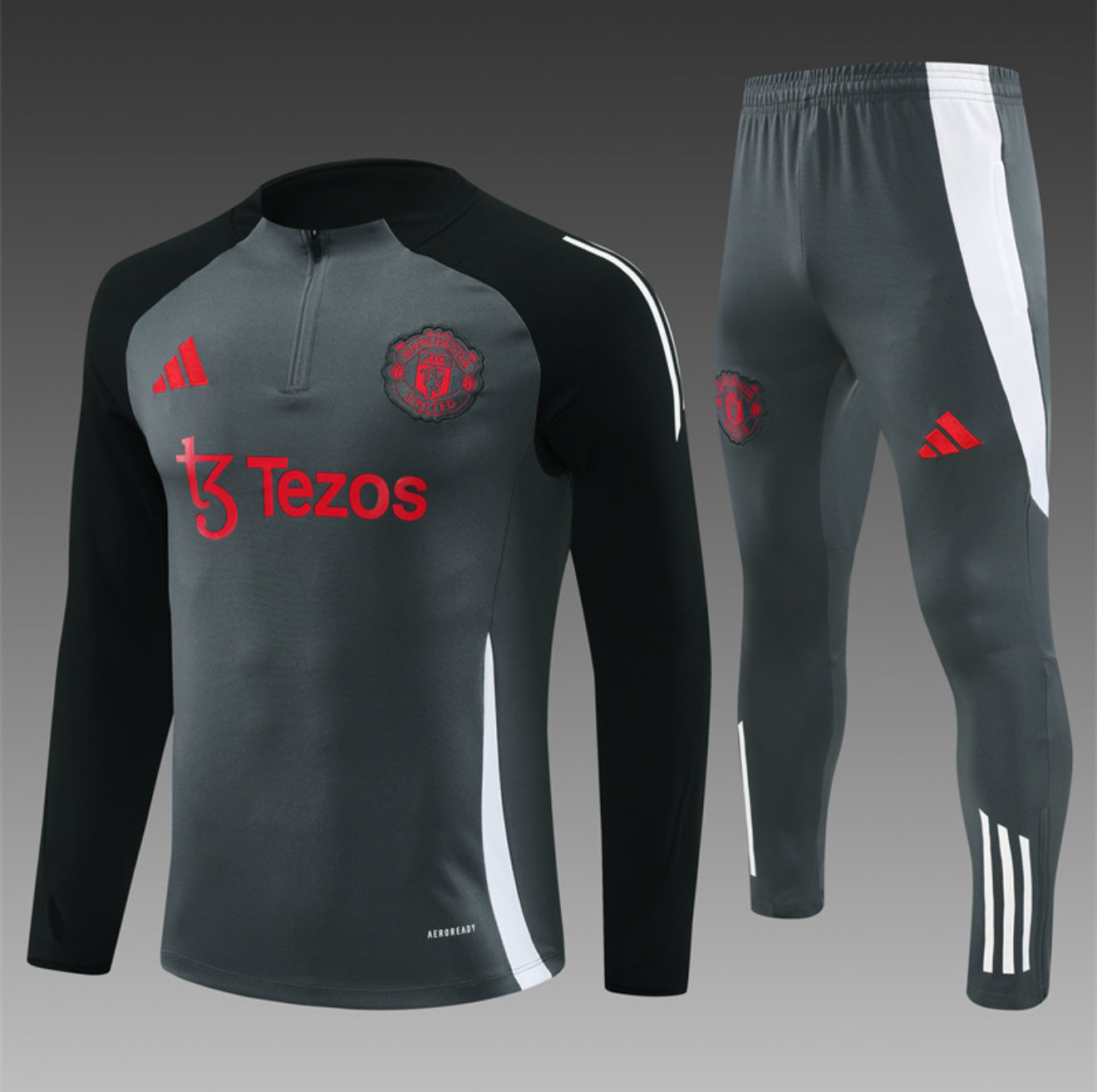 24/25 Manchester United Dark Grey 1/4 Zip Tracksuit