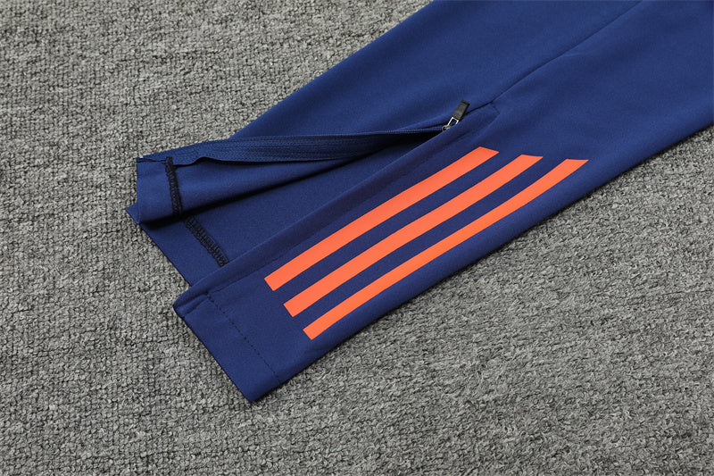 24/25 Manchester United Blue And Orange 1/4 Zip Tracksuit