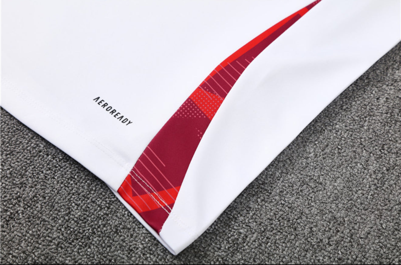 24/25 Manchester United White, Black And Red 1/4 Zip Tracksuit