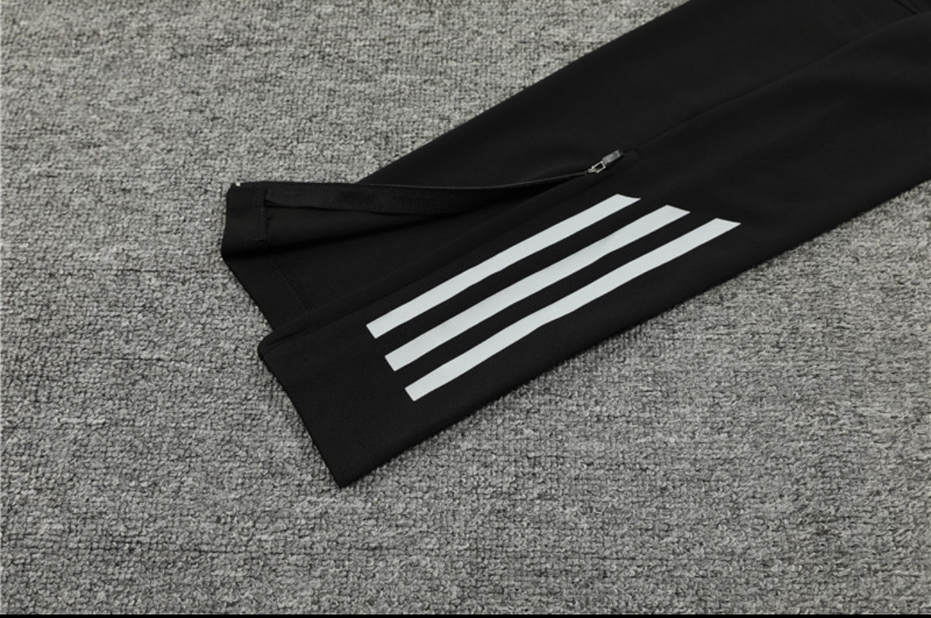 24/25 Manchester United Green And Black 1/4 Zip Tracksuit