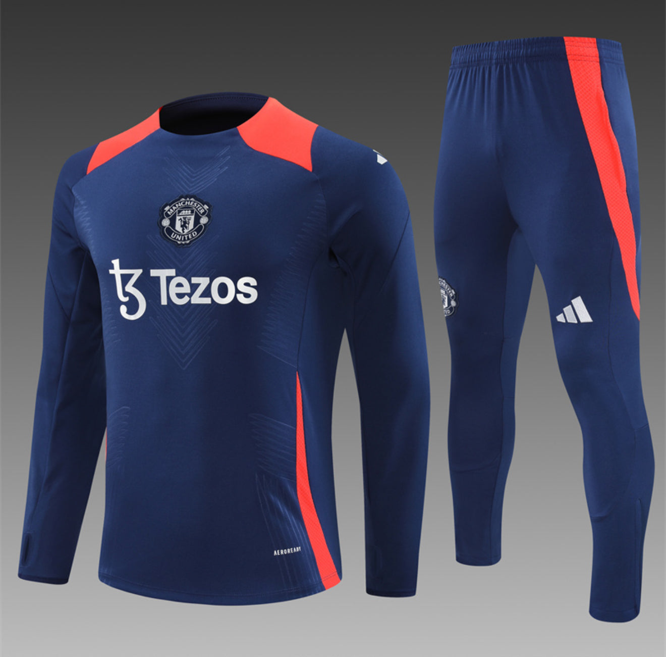 24/25 Manchester United Dark Blue And Orange Tracksuit