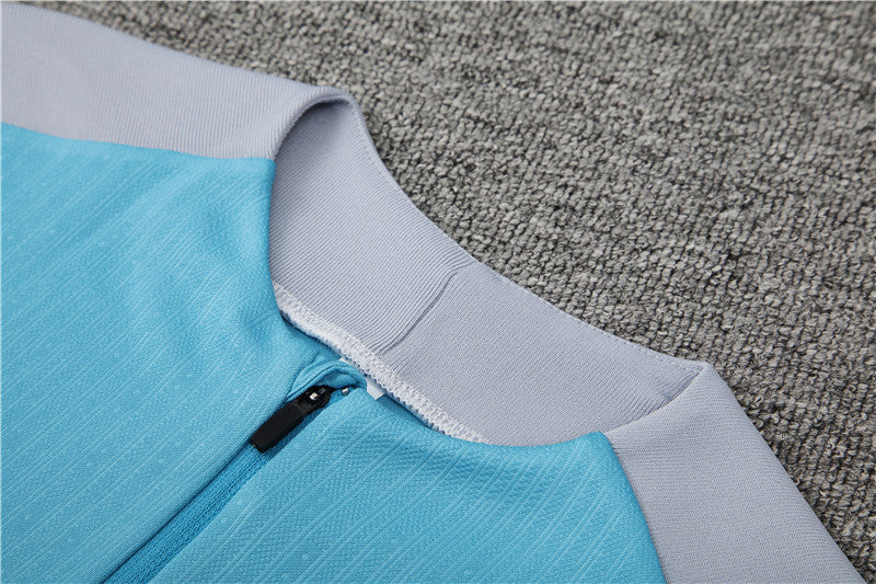 24/25 Atletico Madrid Light Blue And Grey 1/4 Zip Tracksuit