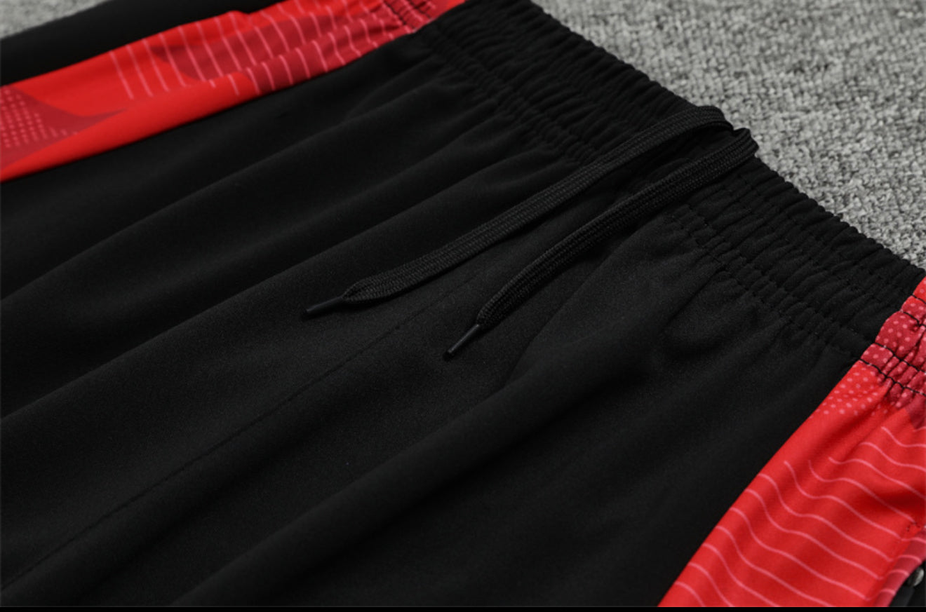 24/25 Manchester United Red, Black And Blue 1/4 Zip Tracksuit